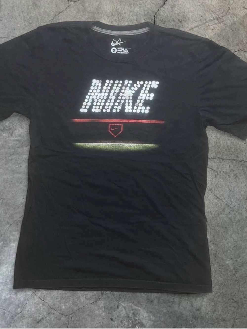 Nike Black Short Sleeve Tee with Reflective Dot Logo and Red/Green Accents